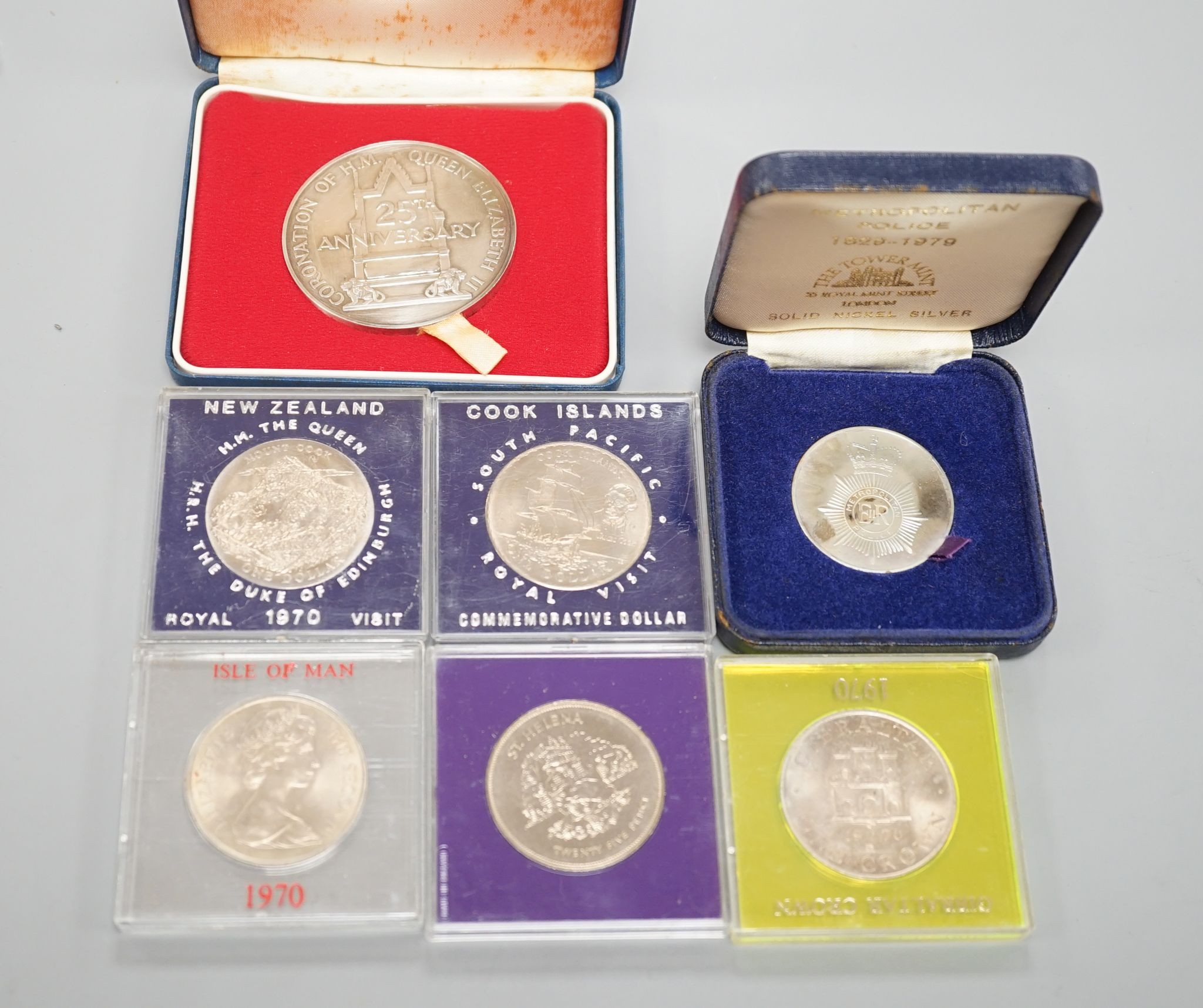 A collection of QEII Royal Mint, Pobjoy mint silver and Brilliant UNC coins including a 1978 25th anniversary conronation silver coin / medal